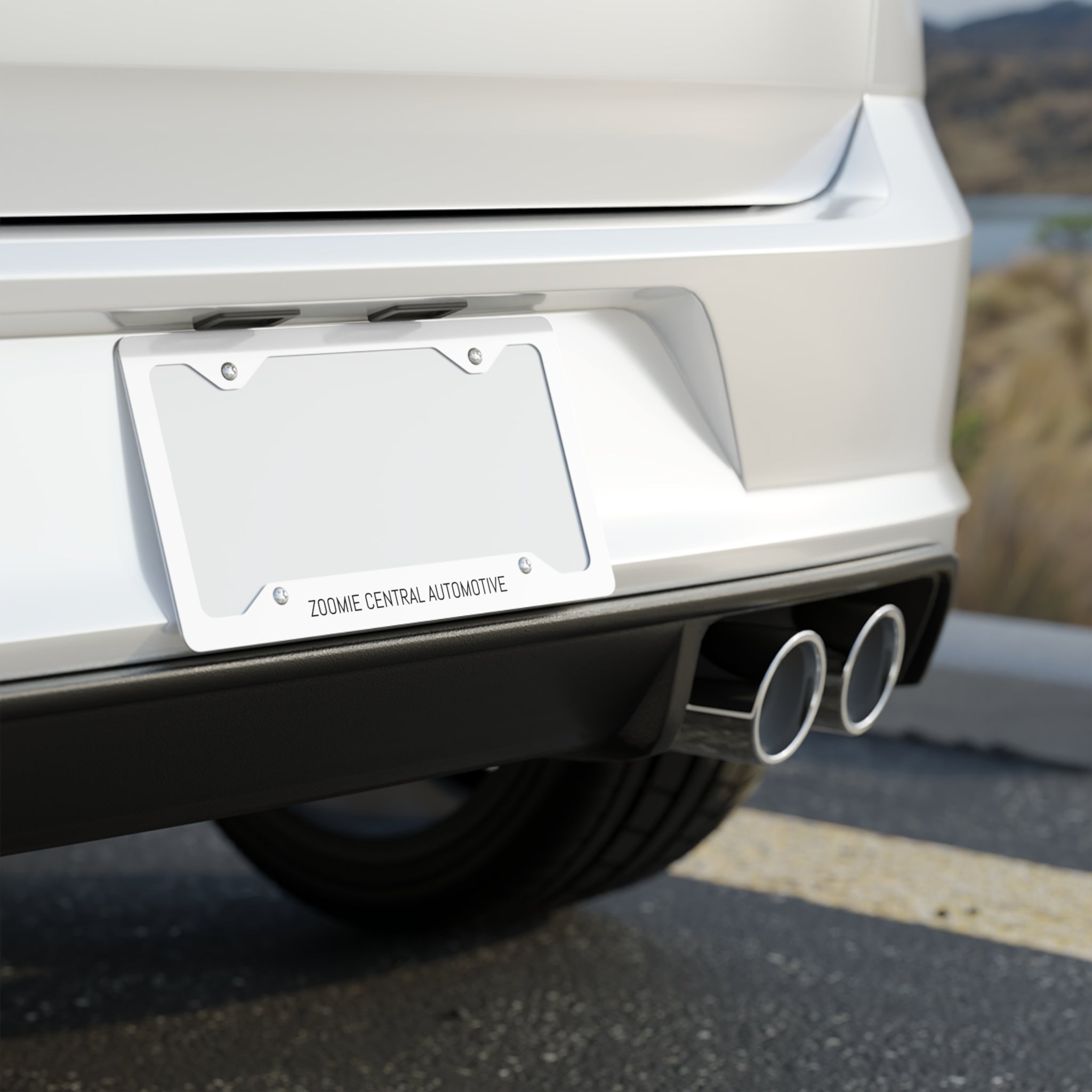 Metal License Plate Frame — "ZOOMIE CENTRAL AUTOMOTIVE"